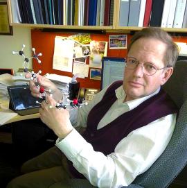 Fred Stevens holding Xanthohumol Molecule